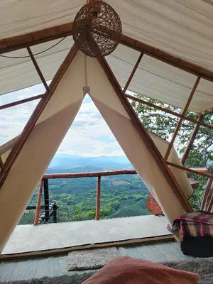 a view from the inside of a tent at Glamping Orosierra in Chinchiná