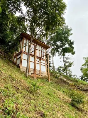 a small building on top of a hill at Viyamar Glamping: Discover Tranquility in Style in Viterbo
