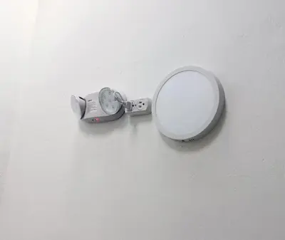 a mirror hanging on a wall with a magnifier at Hermosa casa en el mejor lugar! in Sabaneta