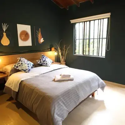 Apartamento cerca Unidad Deportiva Belén - ONE202 By Roots Rentals