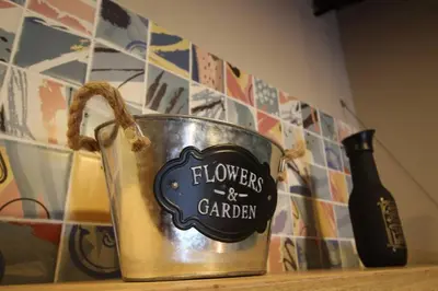 a bucket on a counter next to a bottle of wine at Apartamento Centro Comercial los Molinos - ONE203 By Roots Rentals in Medellín