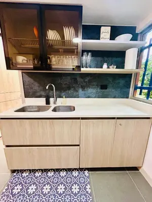 a kitchen with a sink and a counter at Modern, Apt/near tourist sites. in Medellín