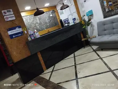 a view of the lobby of a restaurant with a counter at Hotel Park Caribe in Medellín