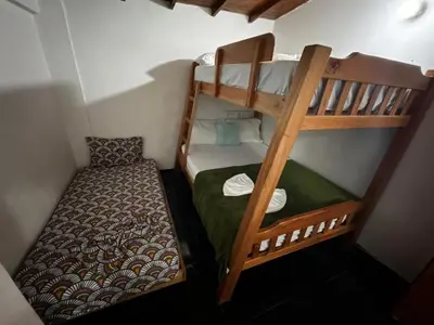 a couple of bunk beds in a room at Aparta Suite Torre De Prado 501 in Medellín