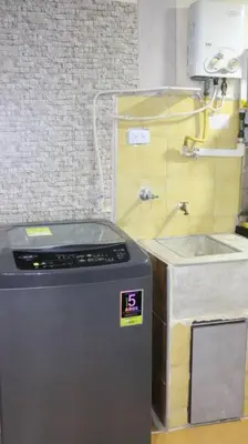 a machine sitting in a room with a counter at Hermosa casita cerca al centro in Medellín