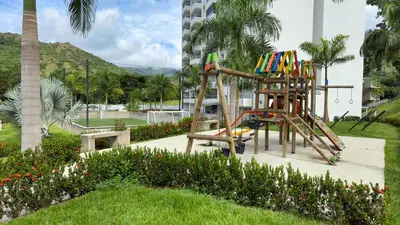 a playground with a ladder and a slide at Stunning, Brand-new Apartment in Santa Fe de Antioquia