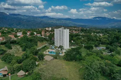 an aerial view of a white building in a city at Stunning, Brand-new Apartment in Santa Fe de Antioquia