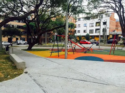 a park with a playground with a swing at Hermoso apartamento con terraza in Medellín