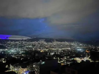 a view of a city at night with lights at Medellin Hermoso apartamento in Medellín