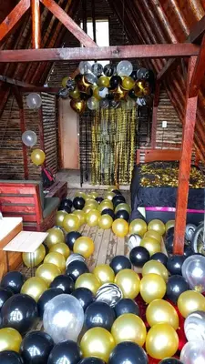 a room with many different types of balloons in it at Glamping Milagros in San Pedro
