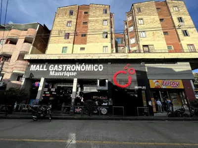a small store on the side of a street at apartamento grande, hermoso, acogedor y privado in Medellín
