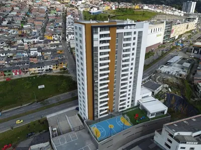 an overhead view of a large white building in a city at Confortable apartamento in Manizales