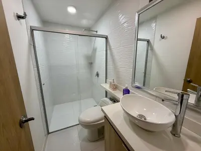 a bathroom with a shower and a sink and a toilet at Apartamento en laureles con excelente ubicación in Medellín