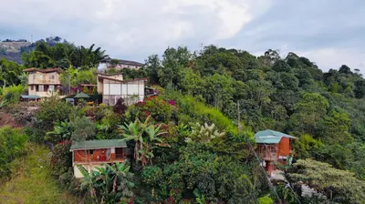a group of houses on top of a hill at Mirador Finca Morrogacho in Manizales