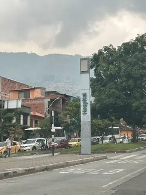 a pole on the side of a city street at Medellin, elegante y central apartamento in Medellín