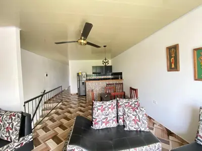 a living room with a couch and a fireplace at Apartamento bustos in Puerto Triunfo