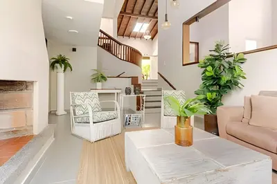 a living room with a couch and a table at NUEVA Mansion con piscina y jacuzzi, El Poblado in El Poblado