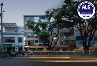 a city street with a building in the background at Ayenda 1234 Imperio 70 in Medellín