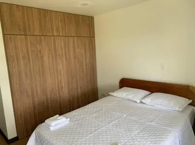 a bedroom with a bed with two towels on it at Hermosa casa de campo en ambiente tranquilo. in Rionegro