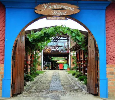 an archway with an entrance to a building at Hotel Kantarrana Urbana Jardin in Jardin