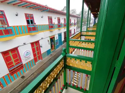 a view from the balcony of a building with colorful windows at Balcones del Parque Jardin in Jardin