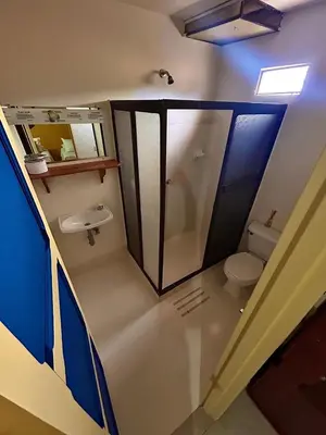 an overhead view of a bathroom with a toilet and sink at Hotel Dorado Jardín in Jardin