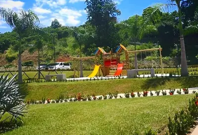 a playground with a slide in a park at occidente colonial santa fe de Antioquia tipo resort Aparta sol tobogán kanaloa parque acuático in Santa Fe de Antioquia