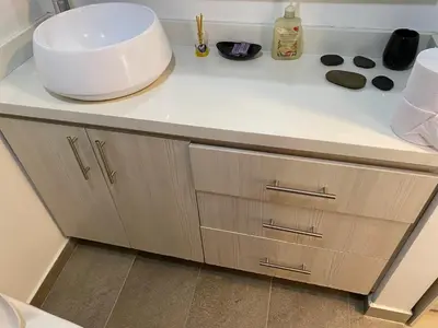 a kitchen counter with a sink and a bowl on it at 712 Apartasuite moderna - en el corazón del poblado medellín in Medellín