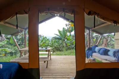 a view from the inside of a tent at Glamping Jardín in Jardin
