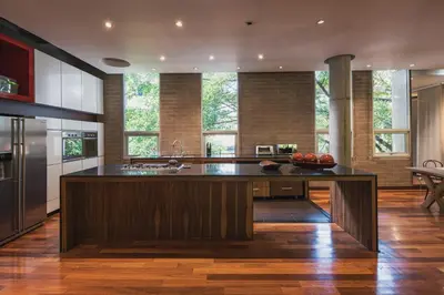 a kitchen with a large island in the middle at Soho Lofts by Vibra Bonita in Medellín