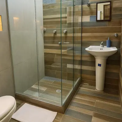 a bathroom with a shower and a toilet and a sink at Apto 201 Sweet Home Medellín in Medellín