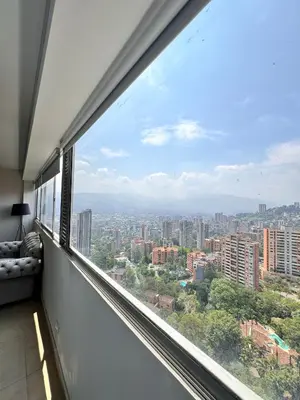 a view from a window of a city at 2511 Suite Moderna y de lujo con la mejor vista a la ciudad - Poblado Medellín in Medellín