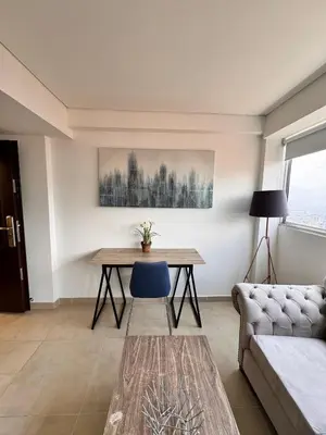 a living room with a table and a couch at 2511 Suite Moderna y de lujo con la mejor vista a la ciudad - Poblado Medellín in Medellín