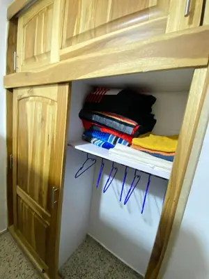 a cupboard filled with lots of towels in a room at Hermoso apartamento en zona central de Medellín in Medellín