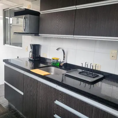 a kitchen with a sink and a counter top at LA CASA DEL CABLE -Comodo Apartamento 102- in Manizales