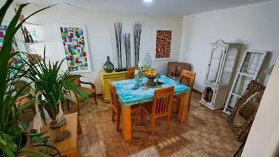 a dining room with a table and chairs at Habitación Privada en Apartamento, Conquistadores in Medellín