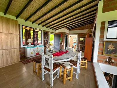 a dining room with a table and chairs at Casa de Campo en San Pedro in San Pedro