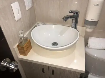 a bathroom with a sink and a toilet at 1009 Apartamento acogedor en el poblado Medellín in Medellín