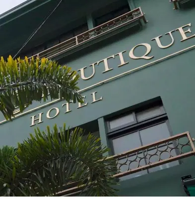 a hotel sign on the side of a building at DUO BOUTIQUE HOTEL in Medellín