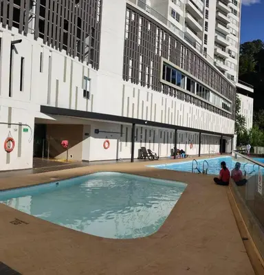 a large swimming pool in front of a building at apto poblado a 8 min de provenza con free parking in Medellín