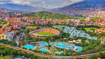 an aerial view of a city with a stadium at Apartamento en el Estadio-Obelisco in Medellín