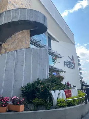a building with a sign on the side of it at LA CASA DEL CABLE -Atractivo Único Apartamento Sector Cable in Manizales