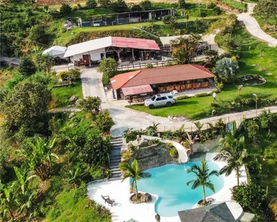 an aerial view of a resort with a swimming pool at Eco Hotel Samaria , Aguas y Bosques in San Rafael