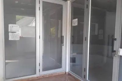 a sliding glass door in a room with at Disfruta en Paraíso del Sol T9-402 in San Jerónimo
