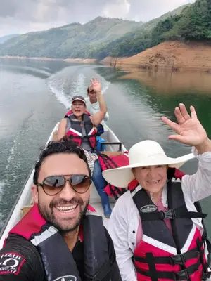 a group of people on a boat on a river at COCOZNA Glamping in Norcasia