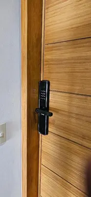 a black door knob on a wooden door at Double Master Provenza Penthouse, home gym&offices in Medellín