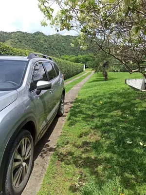 a car parked on the side of a road at Piscina-jacuzzi-calma-comodidad-Villa Old Havana in Santa Fe de Antioquia