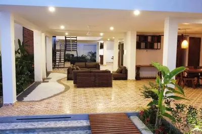 a living room with a couch and a table at Casa Amarilla in Honda