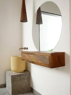 a bathroom with a mirror and a sink at Casa Amarilla in Honda