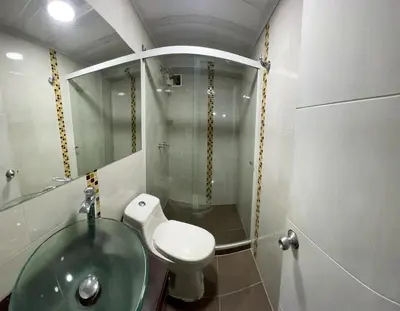 a bathroom with a sink and a toilet and a shower at Cerca a provenza. Amplio. Con todo cerca 273 DG in Medellín